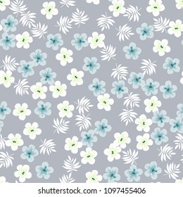 Beautiful tropical seamless pattern with flowers and leaves. Flowers of the jungle. Summer background with tropical leaves and flowers for fabric, wallpaper and cover