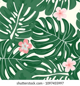 Beautiful tropical seamless pattern with flowers and leaves. Flowers of the jungle. Summer background with tropical leaves and flowers for fabric, wallpaper and cover