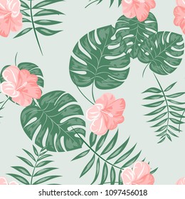 Beautiful tropical seamless pattern with flowers and leaves. Flowers of the jungle. Summer background with tropical leaves and flowers for fabric, wallpaper and cover