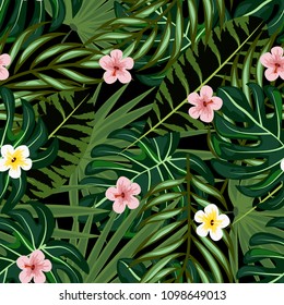 Beautiful tropical seamless pattern with flowers and leaves. Flowers of the jungle. Summer background with tropical leaves and flowers for fabric, wallpaper and cover