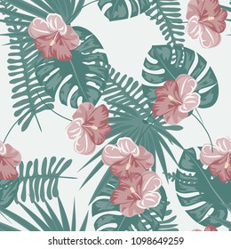 Beautiful tropical seamless pattern with flowers and leaves. Flowers of the jungle. Summer background with tropical leaves and flowers for fabric, wallpaper and cover