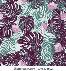 Beautiful tropical seamless pattern with flowers and leaves. Flowers of the jungle. Summer background with tropical leaves and flowers for fabric, wallpaper and cover