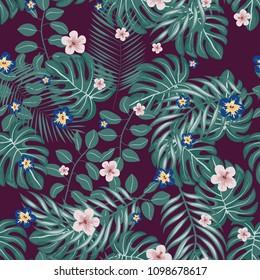 Beautiful tropical seamless pattern with flowers and leaves. Flowers of the jungle. Summer background with tropical leaves and flowers for fabric, wallpaper and cover