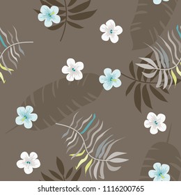 Beautiful tropical seamless pattern with flowers and leaves. Flowers of the jungle. Summer background with tropical leaves and flowers for fabric, wallpaper and cover.