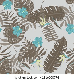 Beautiful tropical seamless pattern with flowers and leaves. Flowers of the jungle. Summer background with tropical leaves and flowers for fabric, wallpaper and cover.