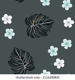 Beautiful tropical seamless pattern with flowers and leaves. Flowers of the jungle. Summer background with tropical leaves and flowers for fabric, wallpaper and cover.