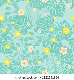 Beautiful tropical seamless pattern with flowers and leaves. Flowers of the jungle. Summer background with tropical leaves and flowers for fabric, wallpaper and cover