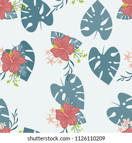 Beautiful tropical seamless pattern with flowers and leaves. Flowers of the jungle. Summer background with tropical leaves and flowers for fabric, wallpaper and cover