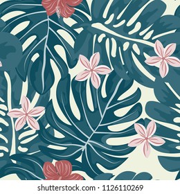 Beautiful tropical seamless pattern with flowers and leaves. Flowers of the jungle. Summer background with tropical leaves and flowers for fabric, wallpaper and cover