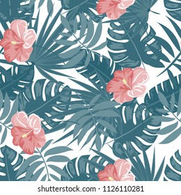 Beautiful tropical seamless pattern with flowers and leaves. Flowers of the jungle. Summer background with tropical leaves and flowers for fabric, wallpaper and cover