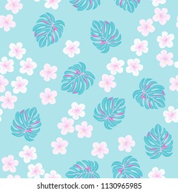 Beautiful tropical seamless pattern with flowers and leaves. Flowers of the jungle. Summer background with tropical leaves and flowers for fabric, wallpaper and cover