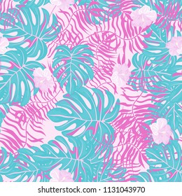 Beautiful tropical seamless pattern with flowers and leaves. Flowers of the jungle. Summer background with tropical leaves and flowers for fabric, wallpaper and cover