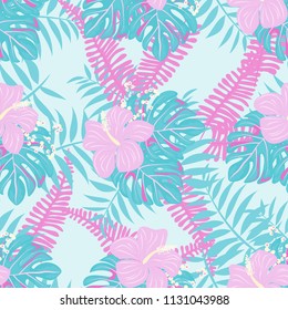Beautiful tropical seamless pattern with flowers and leaves. Flowers of the jungle. Summer background with tropical leaves and flowers for fabric, wallpaper and cover