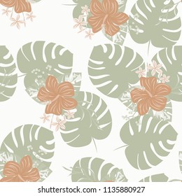 Beautiful tropical seamless pattern with flowers and leaves. Flowers of the jungle. Summer background with tropical leaves and flowers for fabric, wallpaper and cover