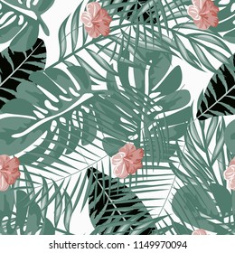 Beautiful tropical seamless pattern with flowers and leaves. Flowers of the jungle. Summer background with tropical leaves and flowers for fabric, wallpaper and cover