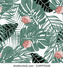 Beautiful tropical seamless pattern with flowers and leaves. Flowers of the jungle. Summer background with tropical leaves and flowers for fabric, wallpaper and cover