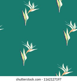 Beautiful tropical seamless pattern with flowers strelitzia. Summer background with tropical flowers on a blue background.