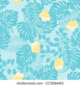 Beautiful tropical seamless pattern with flowers and leaves. Flowers of the jungle. Summer background with tropical leaves and flowers for fabric, wallpaper and cover