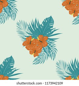 Beautiful tropical seamless pattern with flowers and leaves. Flowers of the jungle. Summer background with tropical leaves and flowers for fabric, wallpaper and cover