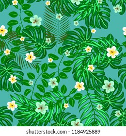 Beautiful tropical seamless pattern with flowers and leaves. Flowers of the jungle. Summer background with tropical leaves and flowers for fabric, wallpaper and cover