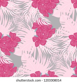 Beautiful tropical seamless pattern with flowers and leaves. Flowers of the jungle. Summer background with tropical leaves and flowers for fabric, wallpaper and cover