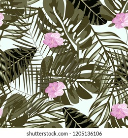 Beautiful tropical seamless pattern with flowers and leaves. Flowers of the jungle. Summer background with tropical leaves and flowers for fabric, wallpaper and cover