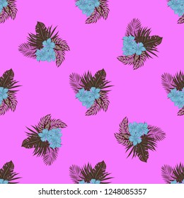 Beautiful tropical seamless pattern with flowers and leaves. Flowers of the jungle. Summer background with tropical leaves and flowers for fabric, wallpaper and cover