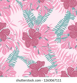 Beautiful tropical seamless pattern with flowers and leaves. Flowers of the jungle. Summer background with tropical leaves and flowers for fabric, wallpaper and cover