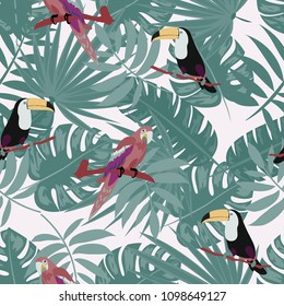 Beautiful tropical seamless pattern with parrot, toucan and leaves. Fashionable background with a parrot. Jungle. Tropical birds.