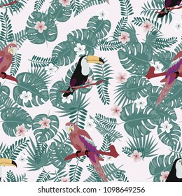 Beautiful tropical seamless pattern with parrot, toucan and leaves. Fashionable background with a parrot. Jungle. Tropical birds.