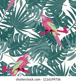 Beautiful tropical seamless pattern with parrot and leaves. Fashionable background with a parrot and flowers. Jungle. Tropical birds.