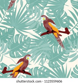 Beautiful tropical seamless pattern with parrot and leaves. Fashionable background with a parrot and flowers. Jungle. Tropical birds.