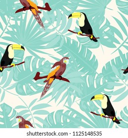 Beautiful tropical seamless pattern with parrot, toucan and leaves. Fashionable background with a parrot. Jungle. Tropical birds.