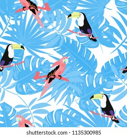 Beautiful tropical seamless pattern with parrot, toucan and leaves. Fashionable background with a parrot. Jungle. Tropical birds.