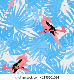 Beautiful tropical seamless pattern with parrot and leaves. Fashionable background with a parrot and flowers. Jungle. Tropical birds.