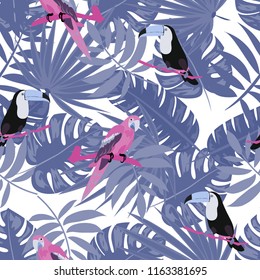 Beautiful tropical seamless pattern with parrot, toucan and leaves. Fashionable background with a parrot. Jungle. Tropical birds.