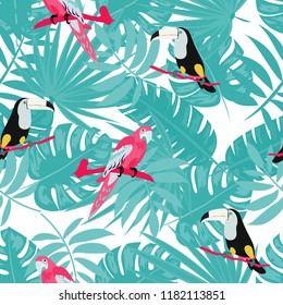 Beautiful tropical seamless pattern with parrot, toucan and leaves. Fashionable background with a parrot. Jungle. Tropical birds.