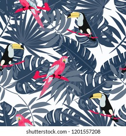 Beautiful tropical seamless pattern with parrot, toucan and leaves. Fashionable background with a parrot. Jungle. Tropical birds.