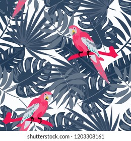 Beautiful tropical seamless pattern with parrot and leaves. Fashionable background with a parrot and flowers. Jungle. Tropical birds.