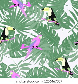 Beautiful tropical seamless pattern with parrot, toucan and leaves. Fashionable background with a parrot. Jungle. Tropical birds.