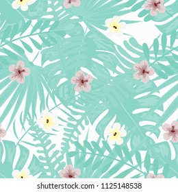 Beautiful tropical seamless pattern with red flowers and blue leaves. Flowers of the jungle. Summer background with tropical leaves and flowers for fabric, wallpaper and cover