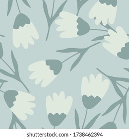 Beautiful tulip seamless pattern on light blue background. Abstract floral backdrop. Spring flower wallpaper. Design for fabric, textile print, wrapping paper, cover. Vintage vector illustration