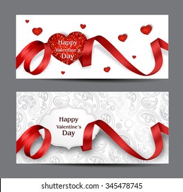 Beautiful Valentine's Day cards with red silk ribbons and textured hearts