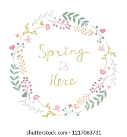 Beautiful vector floral spring wreath in gentle colors isolated on white background. Spring Is Here lettering. Botanical round garland. Flower circle frame. Cute abstract hand drawn flowers & leaves.