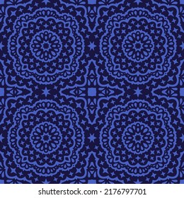 Beautiful vector illustration with abstract blue cosmic seamless pattern on the dark background