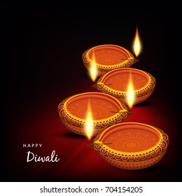 Beautiful Vector illustration of Set of Traditional  Illuminated / burning oil lamp or Floral diyas on Diwali Holiday, ancient Hindu festival of lights ,  with text of Happy Diwali .