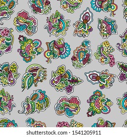 Beautiful vector multicolored hand-drawn seamless pattern, from elements of flowers, berries and leaves.