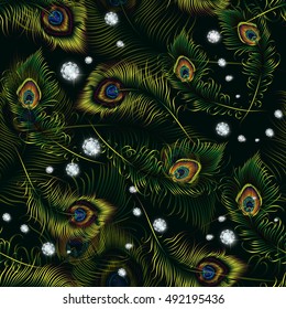 Beautiful vector peacock feathers and diamonds seamless pattern.