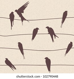 Beautiful vector seamless pattern with birds sitting on wires