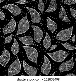 Beautiful vector seamless pattern with curling autumn leaves